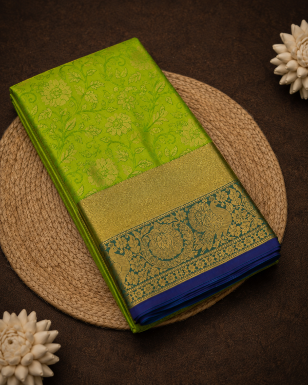 Elegant Green Saree with Floral-Vine Pattern & Peacock Zari Pallu