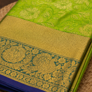 Elegant Green Saree with Floral-Vine Pattern & Peacock Zari Pallu